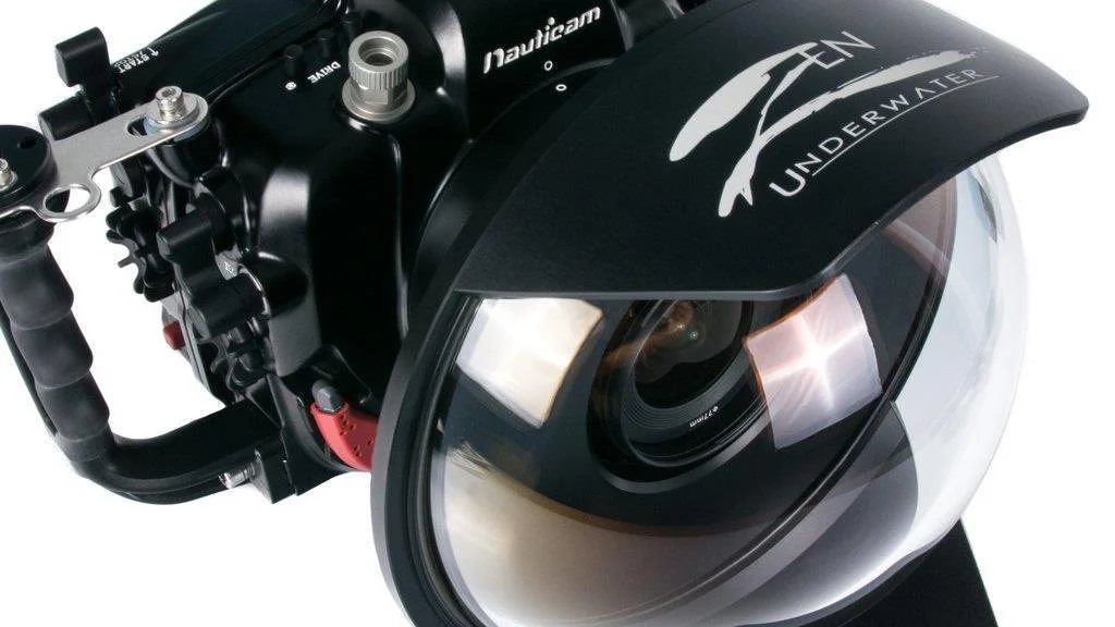 Commercial diver with full-face helmet preparing for offshore work